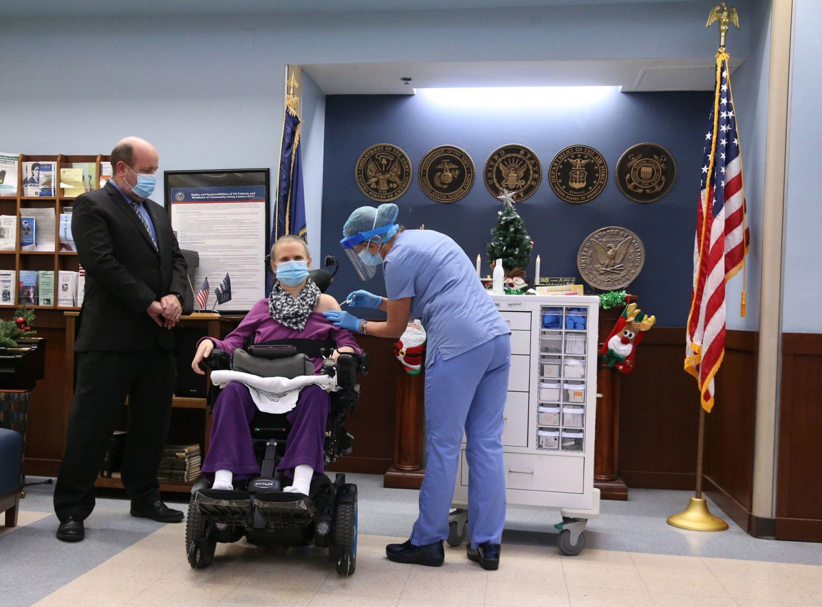 US-NEWS-ILLINOIS-STARTS-ADMINISTERING-COVID-19-VACCINE-2-TB.jpg